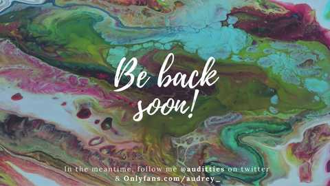 Media: A vibrant digital art piece features abstract, swirling colors in green, blue, red, and purple with white text saying, \"Be back soon!\" at the center.