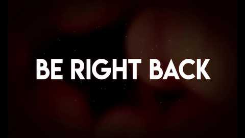 Media: A digital graphic with a dark, abstract background featuring a prominent white text: \"BE RIGHT BACK.\" The style is minimalist, focusing on the stark contrast between the text and the dark, blurred backdrop.