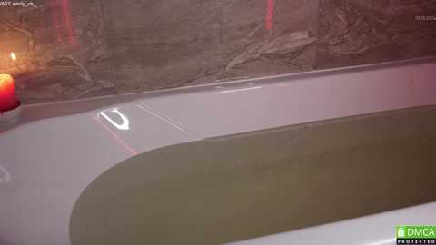 Media: A video of a bathtub with murky, brownish water, partially filled, against a textured, marble-tiled wall with a red light source on the left.