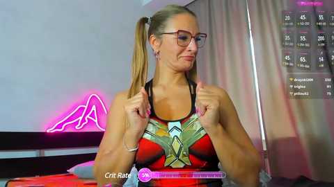 Media: Video of a fit blonde woman with glasses and pigtails, wearing a sports bra with geometric patterns, adjusting a fitness tracker. Neon lights and a fitness app screen are visible in the background.