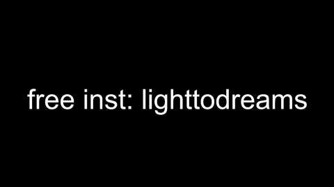 Media: A minimalist digital image featuring the phrase \"free in. Lightto dreams\" in bold white font against a solid black background. The text is centered horizontally and vertically.