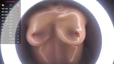 Media: A close-up, slightly blurred video of a nude woman with medium-sized breasts, visible nipples, and smooth, glistening skin. The background is a light, circular shape, possibly a mirror or reflective surface. The image appears to be taken in a clinical setting, likely for medical purposes.