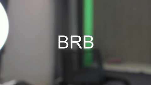 Media: A video shows a blurred, black, cylindrical object with a green stripe. The foreground displays the white text \"BBR\" in bold, capital letters. The background is out of focus, creating a sense of depth.