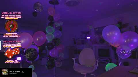 Media: Video of a dimly-lit, purple-hued room with balloons, a white chair, and a table. Text overlays include \"Wheel is Active,\" \"Amanda is on the wheel,\" and \"Roll the dice.\