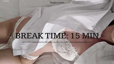 Media: Video of a person wearing white lace lingerie, with the text \"Break Time: 15 Min\" overlaid, featuring a close-up of the torso and lingerie.