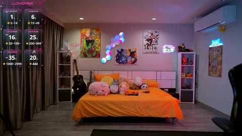 Media: Video of a vibrant, modern bedroom with a large bed adorned with plush toys, colorful wall art, and a black guitar.