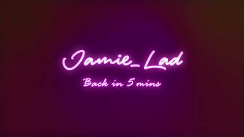 Media: Video of a neon sign spelling \"Jamie-Laid\" in purple cursive on a dark background. Beneath it, in smaller white letters, reads \"Back in 5 mins.\