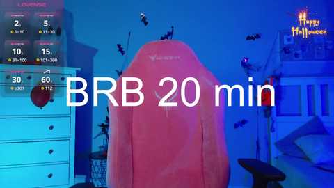 Media: A video of a pink, translucent, inflatable figure in a bedroom, with a blue light and digital clock displaying \"BRB 20 min\" on the wall.