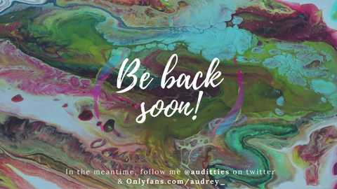 Media: A vibrant digital art piece with a swirling, abstract background featuring hues of green, blue, pink, and purple. Centered text reads, \"Be back soon!\" with a playful, white, cursive font.