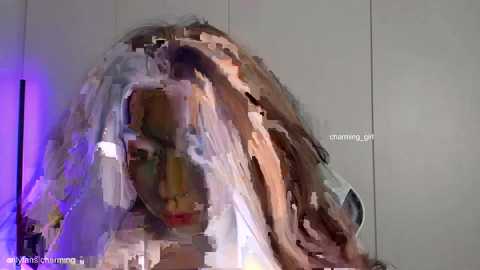 Media: Video of a digitally manipulated face with abstract, blended colors and textures, resembling a melting, surreal portrait.