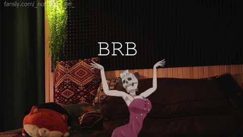 Media: A CGI image featuring a skeletal woman in a pink dress, arms outstretched, standing next to a brown couch with red and gold pillows, and a green plant in a dark room.