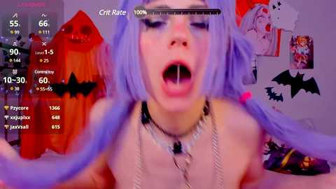 Media: A suggestive, purple-haired woman with a vampire-like face, wearing a choker and necklace, is seen in a video game screen. Background includes a red pumpkin, bat decorations, and a wall adorned with stickers.