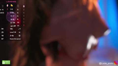 Media: A blurred video of a close-up profile of a person with a white tooth showing, taken in low light. Text overlays with time, location, and weather data.