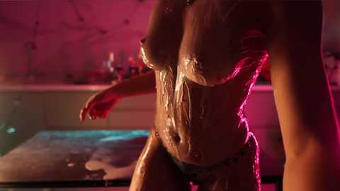 Media: A CGI-rendered, highly detailed, erotic video of a nude woman with medium-sized breasts, slim waist, and wet skin, standing in a dimly lit, pink-lit bathroom, water droplets glistening on her body.