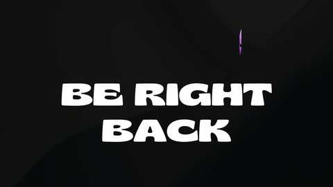 Media: A digital image featuring bold, white, uppercase text \"BE RIGHT BACK\" against a stark black background, with a small, purple, glowing object floating in the upper right corner. The image conveys a sense of anticipation or mystery.