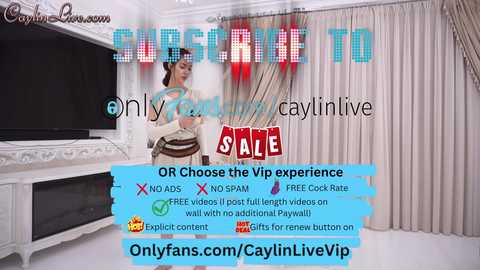 Media: A promotional image for an OnlyFans model, \"CaylinLive,\" featuring a woman in a white dress, holding a drink, in a stylish living room with white curtains and a flat-screen TV.