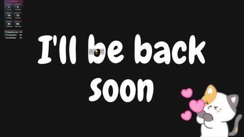 Media: A digital drawing on a black background featuring playful, white, cartoon text saying, \"I'll be back soon,\" accompanied by a cute, smiling cat with pink heart-shaped eyes and a small heart beside it.