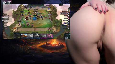 Media: Video of a League of Legends game on a large screen with a close-up of a bare, curvaceous female bottom on the right.