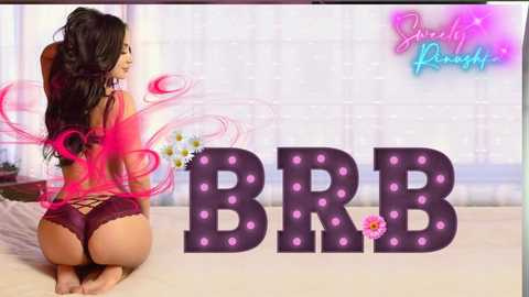 Media: Video of a curvaceous woman with long dark hair, wearing maroon lace lingerie, kneeling on a bed. She faces away, showing her toned back and large buttocks. The background features a white, textured wall and the text \"BBR\" with pink polka dots.