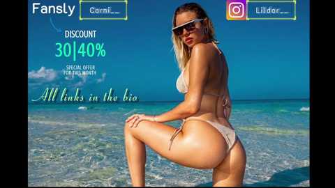 Media: Video of a tan, fit, blonde woman in a bikini, wearing sunglasses, posing on a sunny beach. The background features turquoise water and a clear sky. Text on the image advertises a discount.