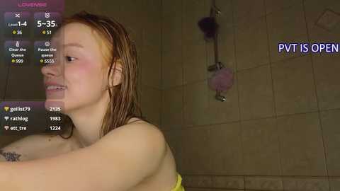 Media: A video shows a fair-skinned, red-haired woman with wet hair, standing in a beige-tiled shower. The image is overlaid with a \"PT IS OPEN\" message and streaming app details.