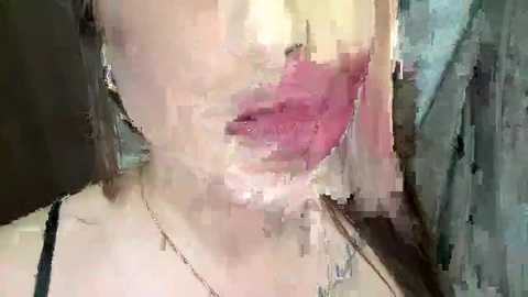 Media: A blurry video captures a close-up of a person's mouth with pink lips, surrounded by a soft, diffused light, creating a dreamy, abstract effect. The background is indistinct and muted, adding to the ethereal quality of the image.