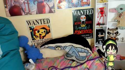 Media: A colorful video of a child's messy bedroom with cartoon posters, a Wanted poster, a plush toy, and a chibi-style anime character overlay.