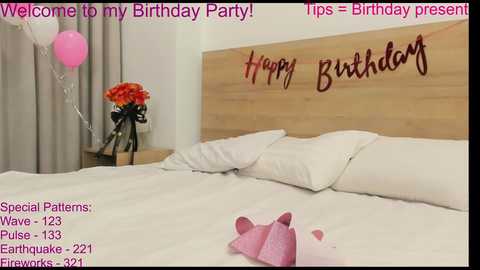 Media: A digital birthday invitation image with a light wooden headboard, white pillows, and a \"Happy Birthday\" sign. A pink balloon and two pink mouse toys are on the bed.