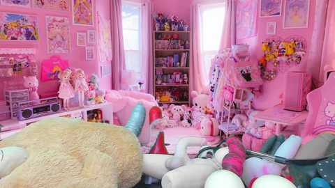 Media: Video of a pink-themed, cluttered bedroom with plush toys, stuffed animals, and a white gaming chair, adorned with anime and Hello Kitty decor, creating a whimsical, chaotic ambiance.