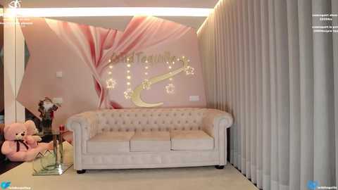 Media: Video of a pastel-colored nursery with a white tufted sofa, a large mural of a tree and starry sky, and white curtains. Soft lighting, plush toys, and a glass coffee table add warmth.