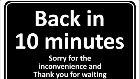 Media: A black road sign with white text reads, \"Back in 10 minutes. Sorry for the inconvenience and Thank you for waiting.\" The message is straightforward and informative, designed for easy readability.