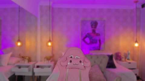 Media: Video of a cozy, dimly lit nail salon with pink and purple lighting, featuring a large, cartoonish pink bunny mask on a client's head, and a framed picture of a woman on the wall.