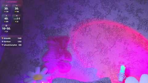 Media: Video of a digitally altered image, featuring a vibrant pink and purple color palette with a glowing, abstract texture overlay, resembling a dream-like or surreal scene.