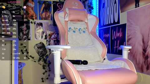 Media: A video of a pink gaming chair with a fluffy blanket, surrounded by posters and a computer screen displaying chat logs. The room is dimly lit with blue ambient lighting.