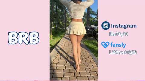 Media: Video of a young woman, seen from behind, walking down a sunlit brick path, wearing a white crop top and short beige skirt. Social media icons for BRR, Instagram, Leftey, Fansly, and LittleFeetFynto are displayed on a pink background.