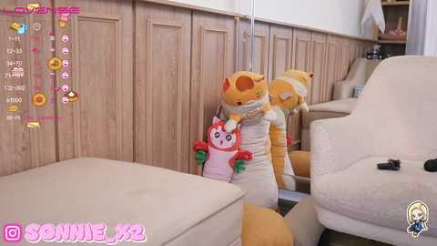 Media: A digital photo depicts a person in a yellow, rabbit-like costume with pink details, hugging a stuffed pink rabbit. The setting is a cozy living room with wooden paneling and a white armchair.