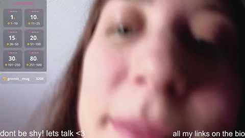 Media: Video of a close-up of a young woman's face with a red, swollen nose and puffy eyes, blurred background, overlaid with a digital temperature chart. Text reads, \"don't be shy, let's talk <3.\