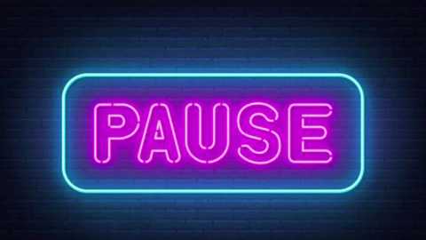 Media: Video of a neon sign with the word \"PAUSE\" in bright pink letters, framed by a glowing blue border, set against a dark brick wall. The sign emits a soft, blue glow.