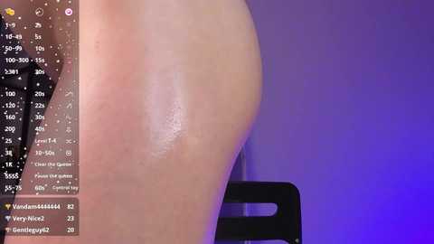 Media: A close-up video of a pale, smooth-skinned person's buttocks with a vertical line of sweat, overlaid with a digital overlay showing a thermometer and heart rate monitor. The background is a gradient of purple to blue.