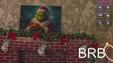 Media: A video of a Christmas-themed living room with a brick fireplace adorned with green garland, red bows, and three stockings. A large painting of Grinch hangs above, surrounded by decorative candles.