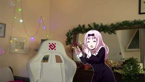 Media: A digital image of a young girl with long pink hair, dressed in a black nun's habit, holding a smartphone, standing in a cozy, warmly lit room with a white gaming chair, fairy lights, and a green garland.