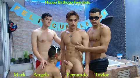 Video of four shirtless, muscular men in a bathroom, one kneeling, celebrating a birthday with \"Feliz Cumplea\u00f1os\" banner.