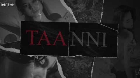 Media: A black and white video with a red \"TAANNNI\" text overlay, showing a distressed woman with long hair, and a man in the background, with a torn, dark background.