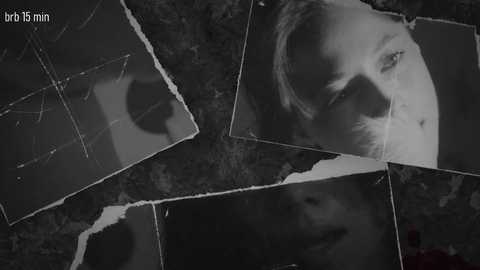 Media: A black-and-white video of a woman's face with a cracked, shattered glass frame, surrounded by jagged edges. The image conveys a sense of trauma and fragility.