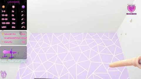 Media: A digital image featuring a white wall with a pink and purple geometric pattern. A hand is painting the wall, while a user interface with chat and game options is visible on the left.