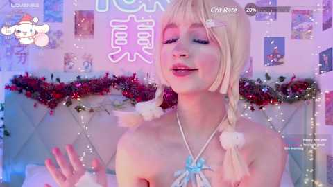 Media: Video of a fair-skinned, blonde-haired woman in a white, fur-trimmed, bikini-like outfit, posing sensually in a festive, Christmas-themed bedroom with a bed, decorations, and posters.