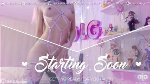 Media: Video of a slender, light-skinned woman with small breasts wearing intricate white harness lingerie, standing in a softly lit, pastel-themed room with colorful decorations. Text overlays announce \"Starting Soon\" and \"Getting Ready for Daddy.\