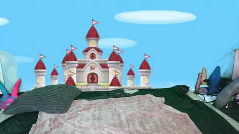 Media: Video of a child's bedroom with a pink blanket, a green beanie, a toy castle on a green carpet, and colorful toys in the background under a blue sky with clouds.