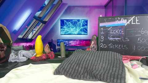 Media: Video of a colorful, cluttered attic bedroom with a messy bed, neon lights, and various sex toys. The room is dimly lit, with a chalkboard displaying sexual activities.