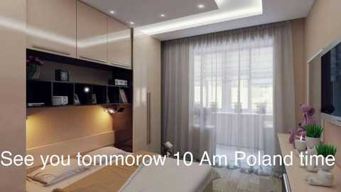 Media: Modern, minimalist bedroom with beige walls, a large bed, built-in dark wood shelving, and a window with sheer curtains. Text reads: \"See you tomorrow 10 Am Poland time.\